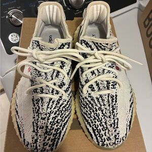 Yeezy Black and Cream Sneakers